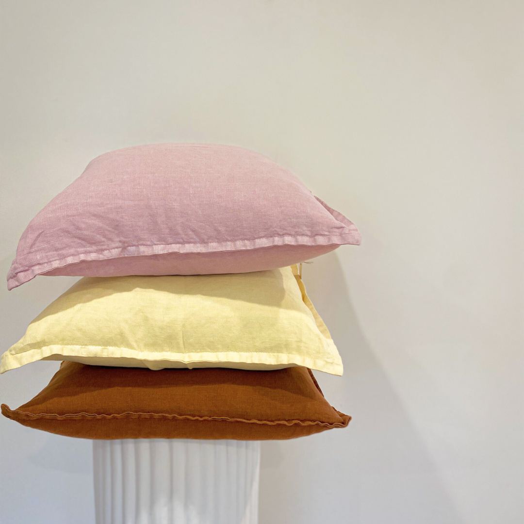 100% belgium linen vintage washed cushion- feather filled in lilac, styled shot