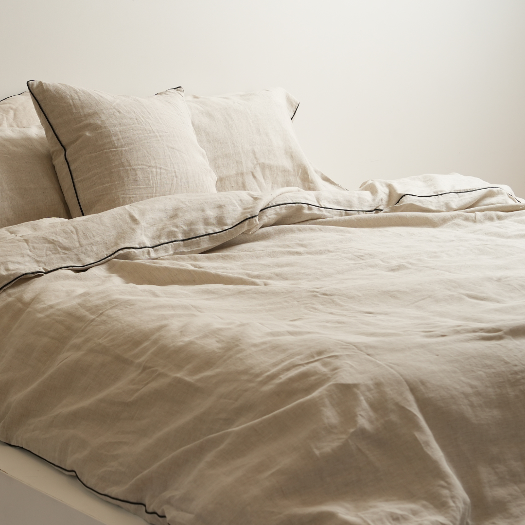 100% french linen piped euro pillowcase in natural oat /black, detail view
