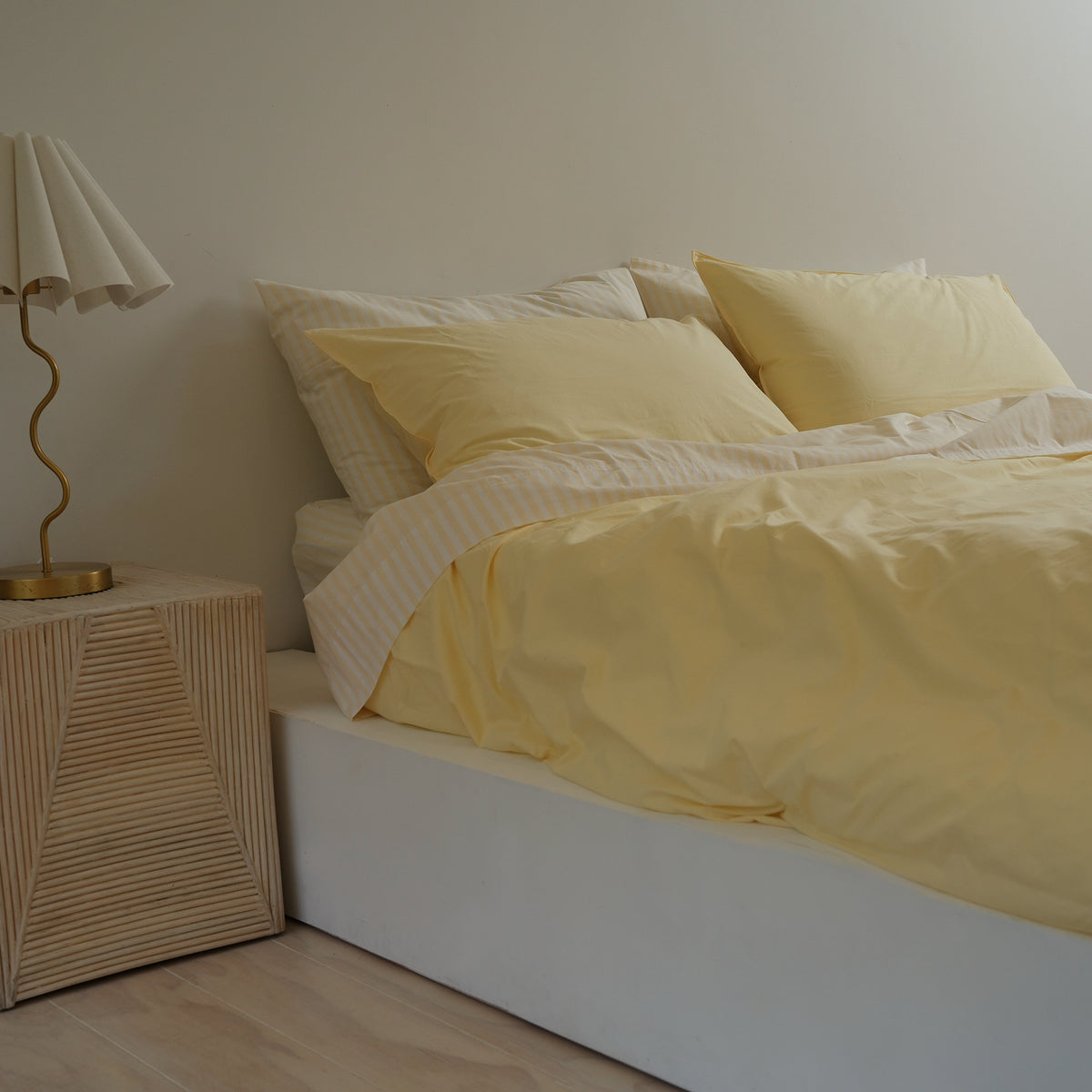100% stonewashed cotton duvet set in butter, close-up