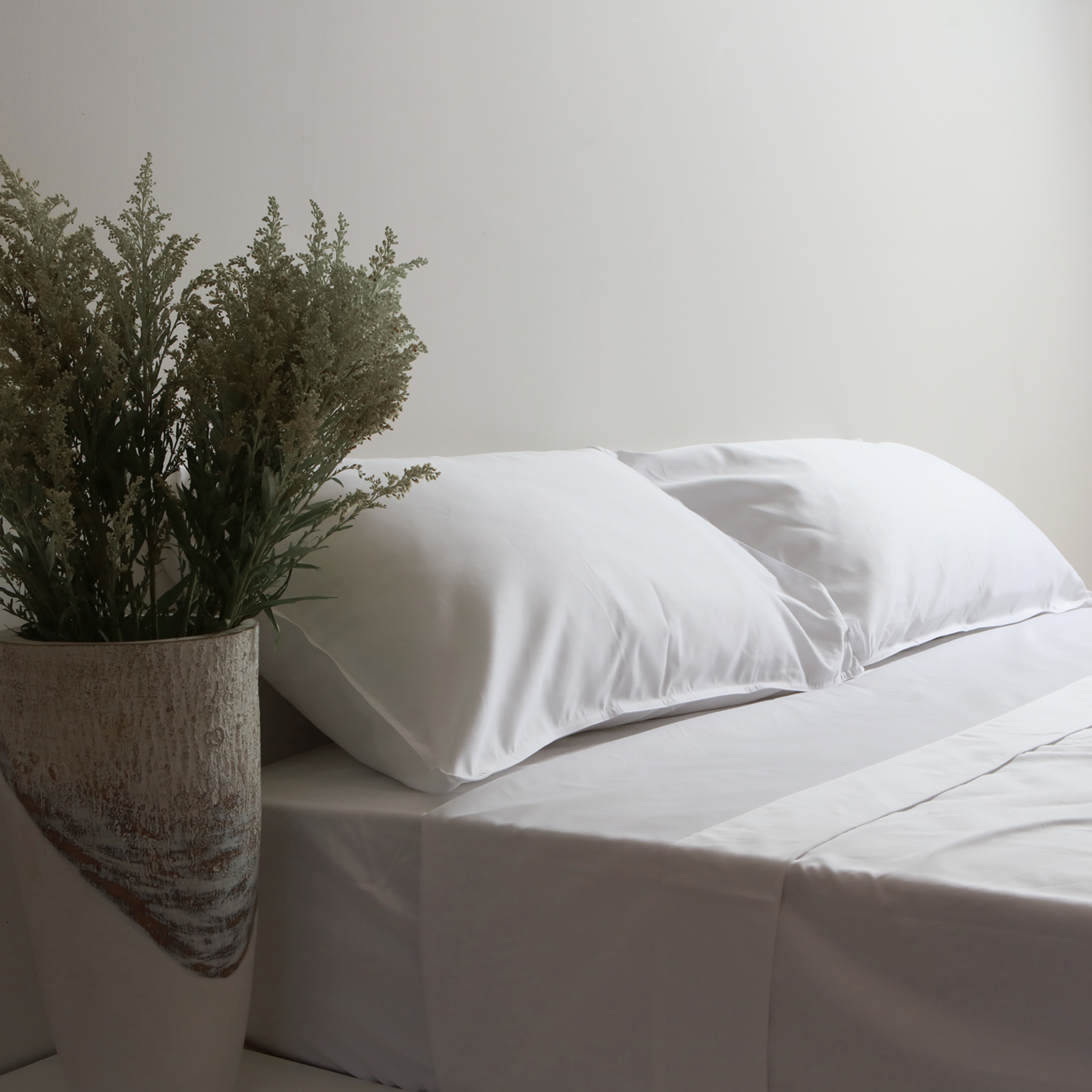 750tc 100% cotton hotel luxe pillowcase pair in crisp white, close-up
