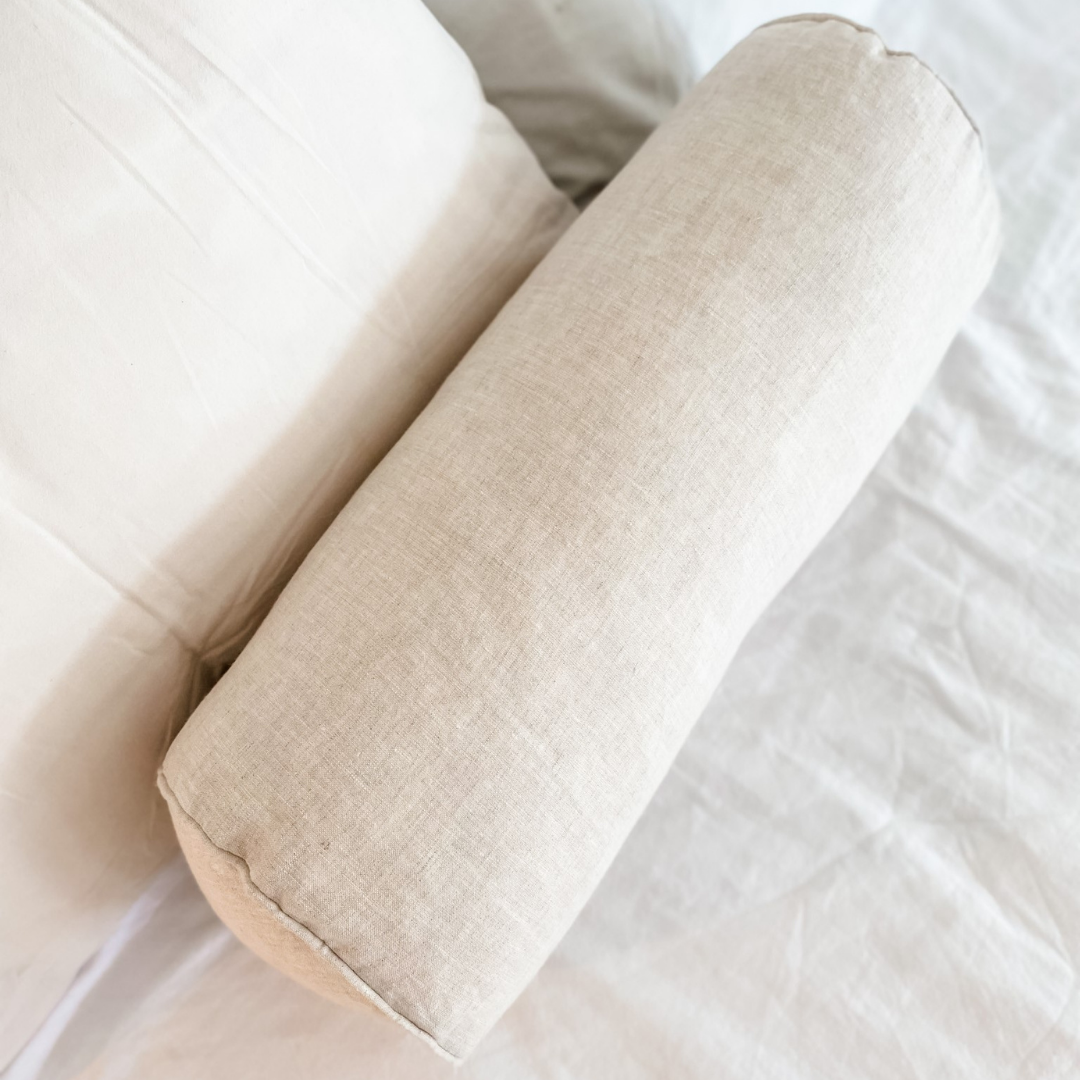 French flax linen feather filled bolster cushion in Natural Oat side view