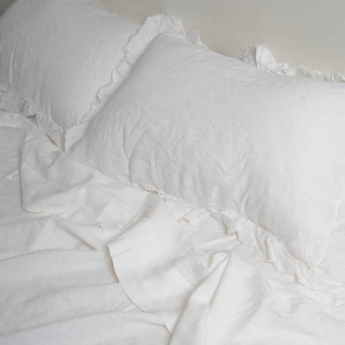 French flax linen ruffle edge pillowcase pair in White side view