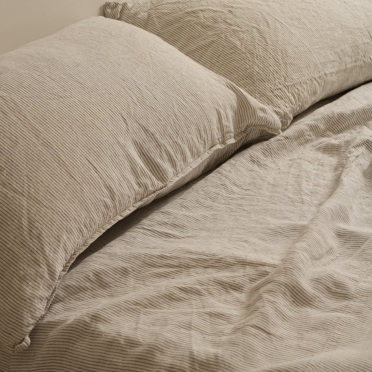 French flax linen sheet set in Charcoal Pinstripe close-up of fabric