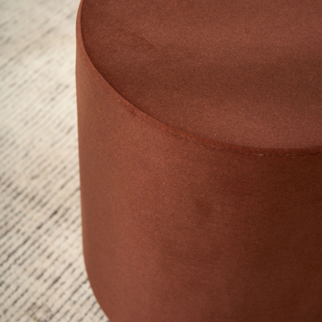 Mee swivel ottoman in Rustwood, compact form, smooth swivel base, detail view