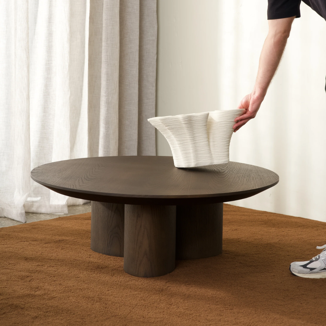 Nova coffee table in oak veneer, softly rounded edges, 100cm dia x 35cm h, side view