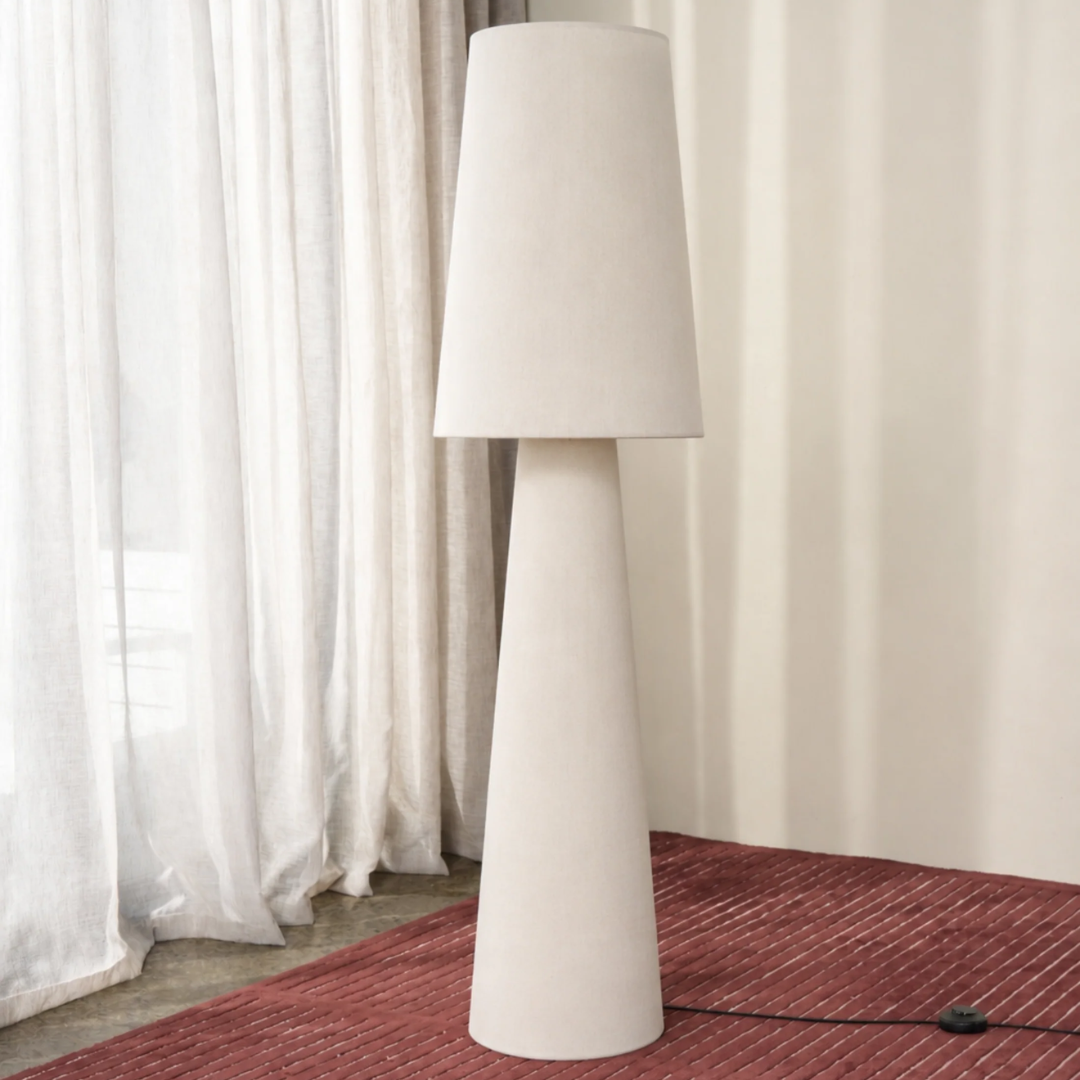Onda floor lamp in natural linen, sculptural base and shade, 150cm tall, side view
