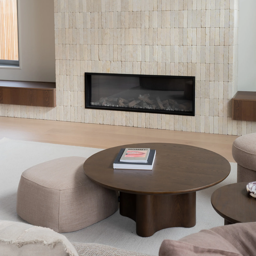 Terry ottoman in Fawn Taupe, rounded form, soft upholstery