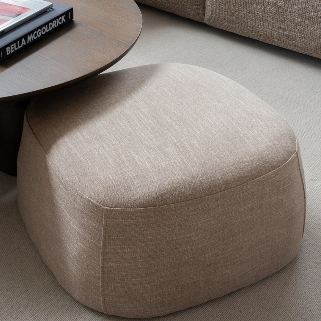 Terry ottoman in Fawn Taupe, rounded form, soft upholstery, detail view