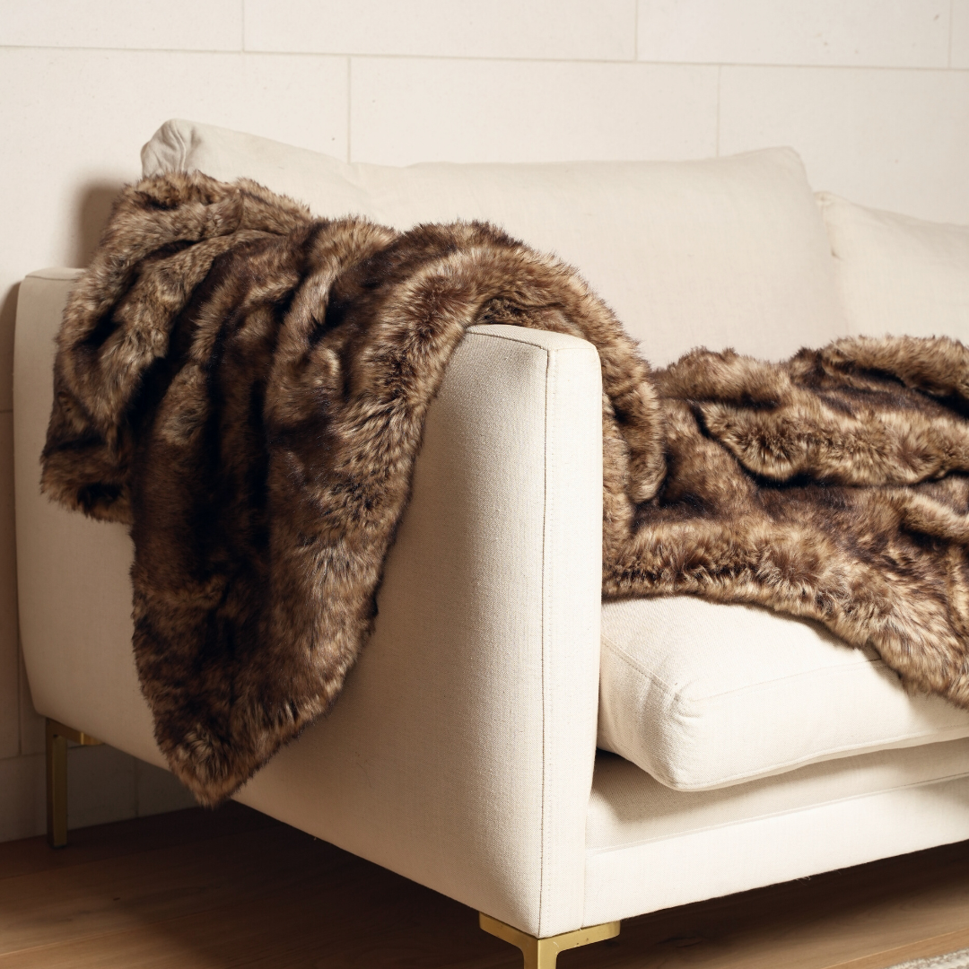 Vegan fur throw in Wolf