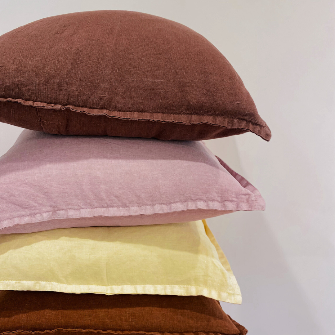 100% belgium linen vintage washed cushion- feather filled in cocoa, styled shot