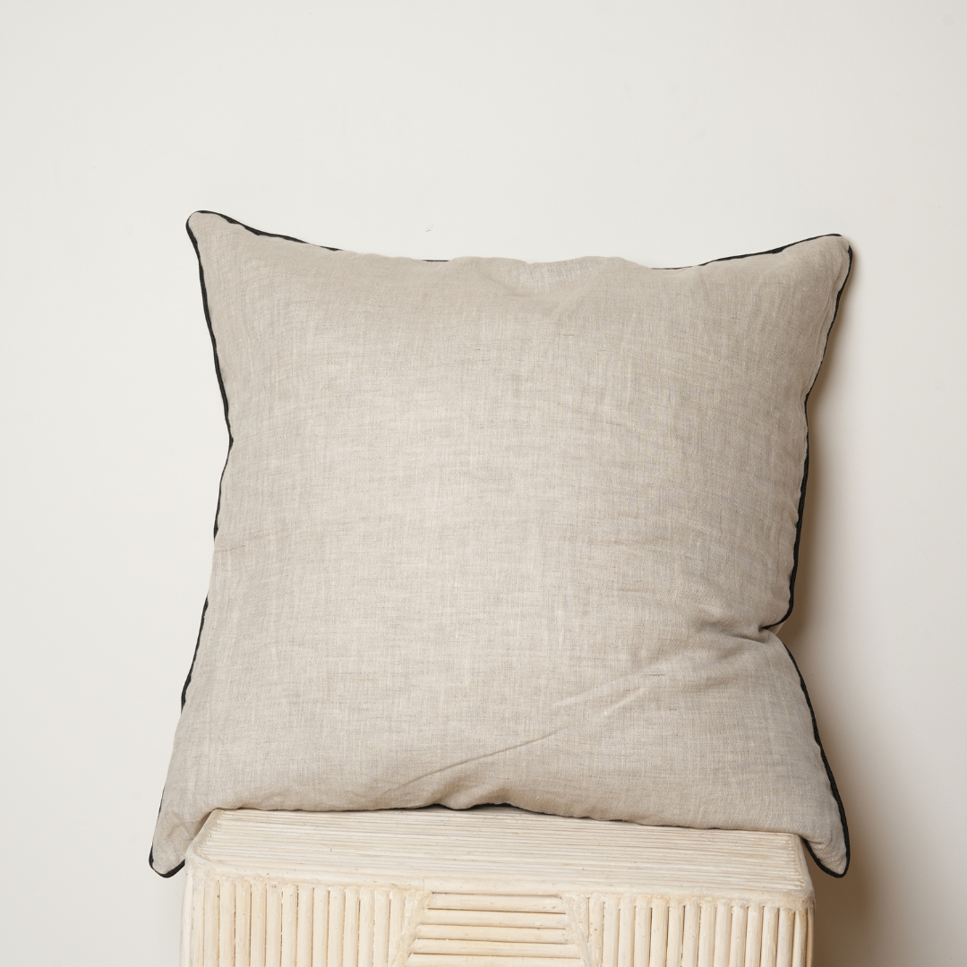 100% french flax linen piped feather filled cushion in natural oat/ black