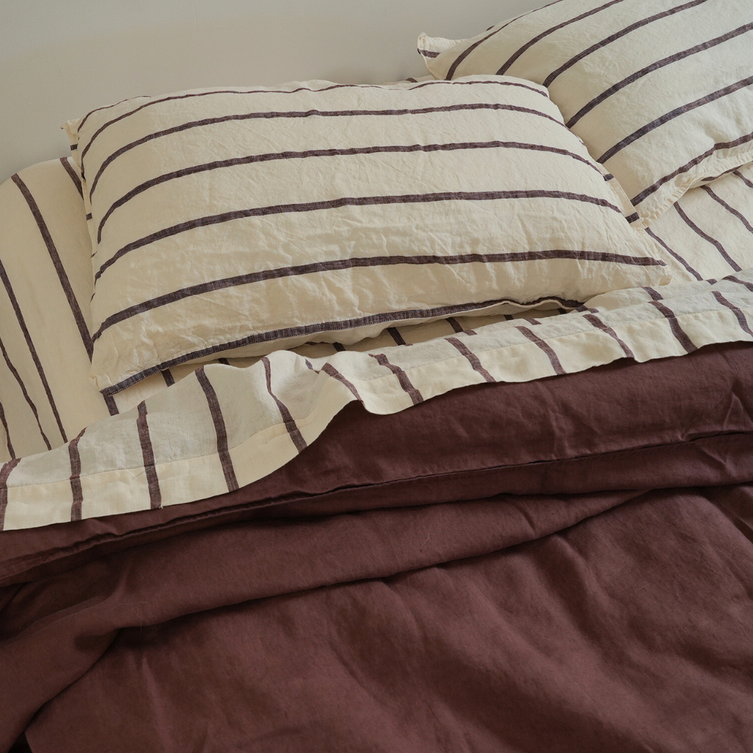 100% french flax linen sheet set in cocoa stripe, styled shot