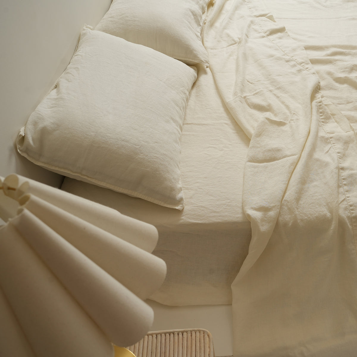 100% french flax linen sheet set in milk, side view