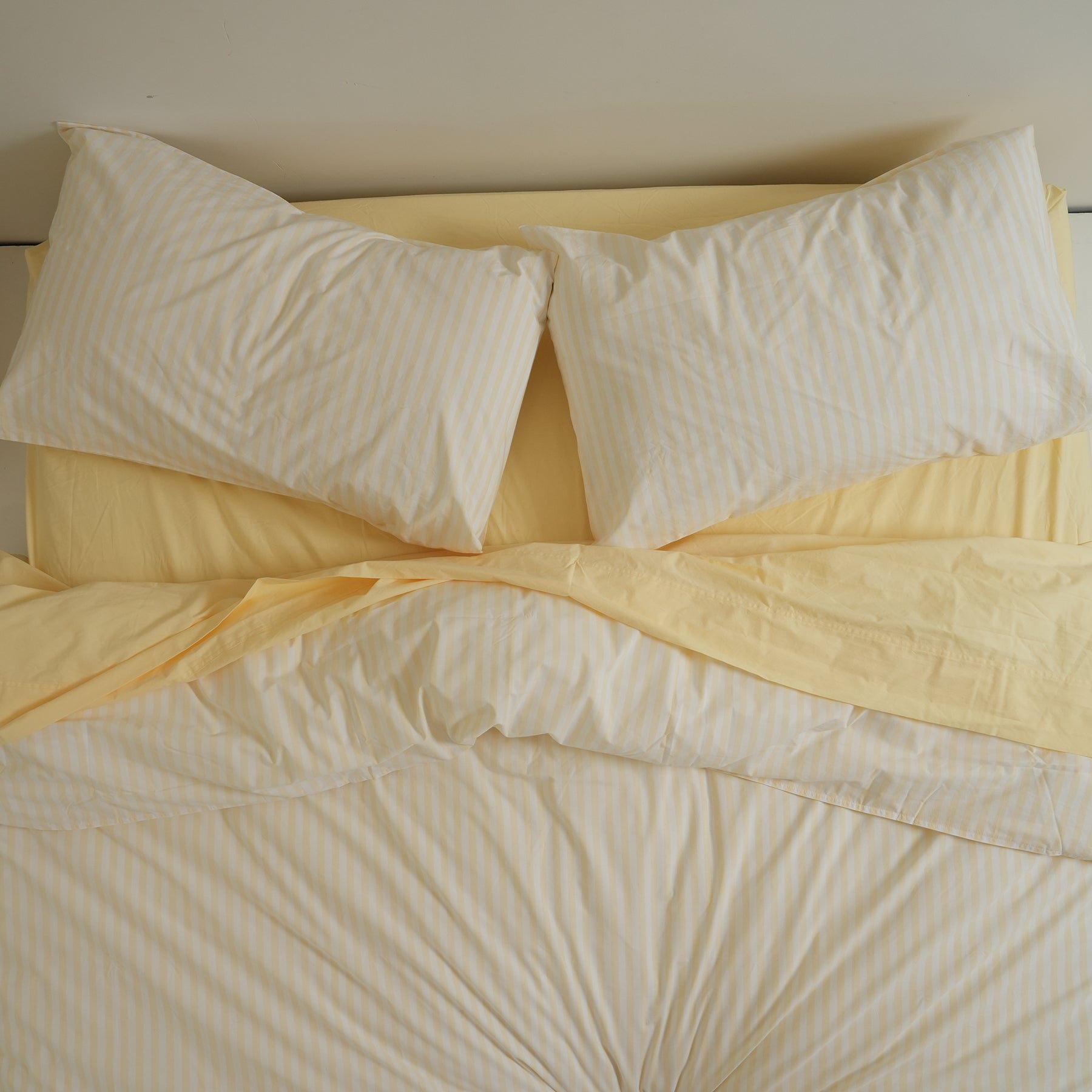 100% stonewashed cotton sheet set in butter, detail view