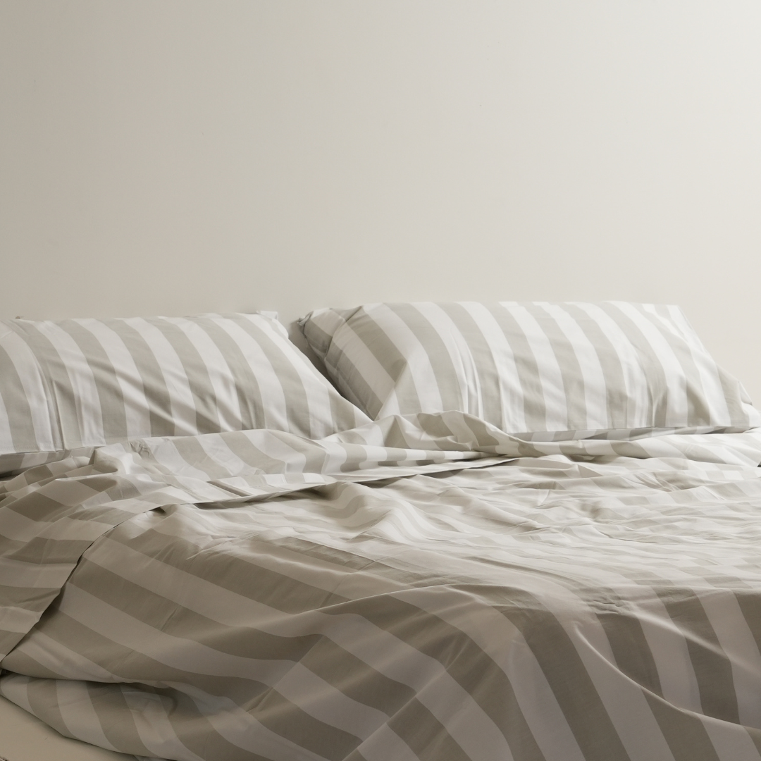 100% stonewashed cotton sheet set in sage stripe, styled shot