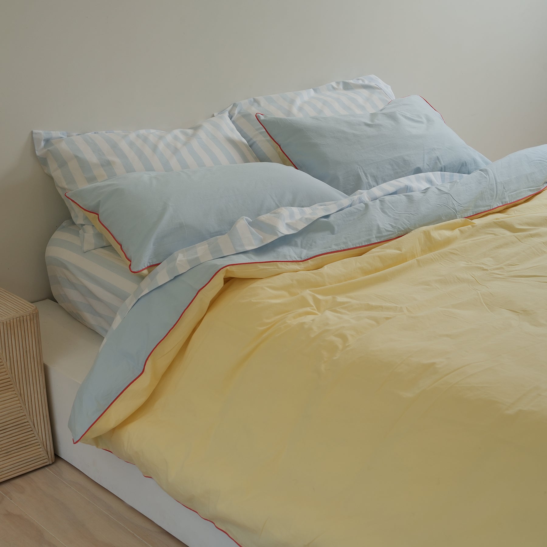 100% stonewashed cotton sheet set in sky blue stripe, styled shot
