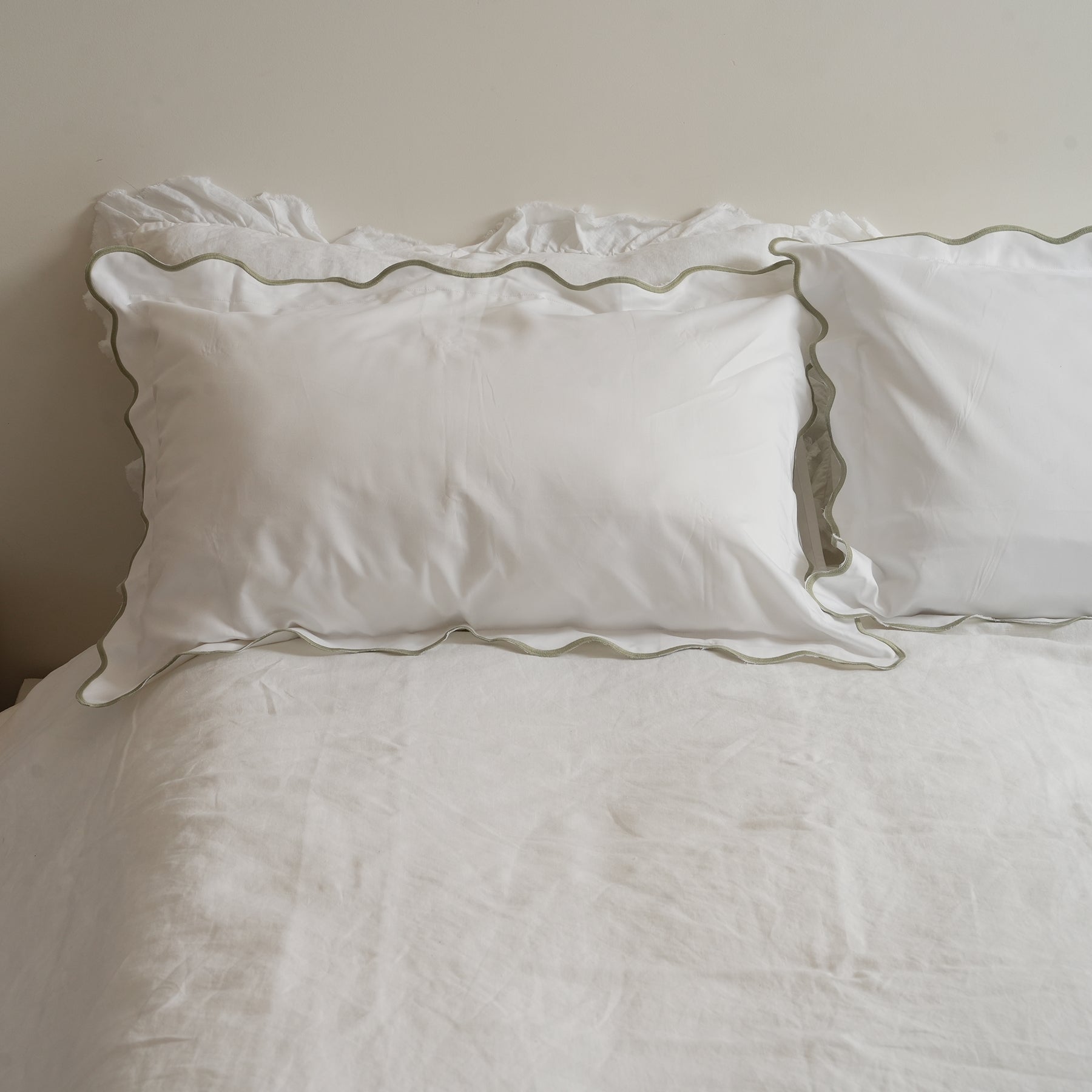 Celine pillowcase pair in sage, detail view