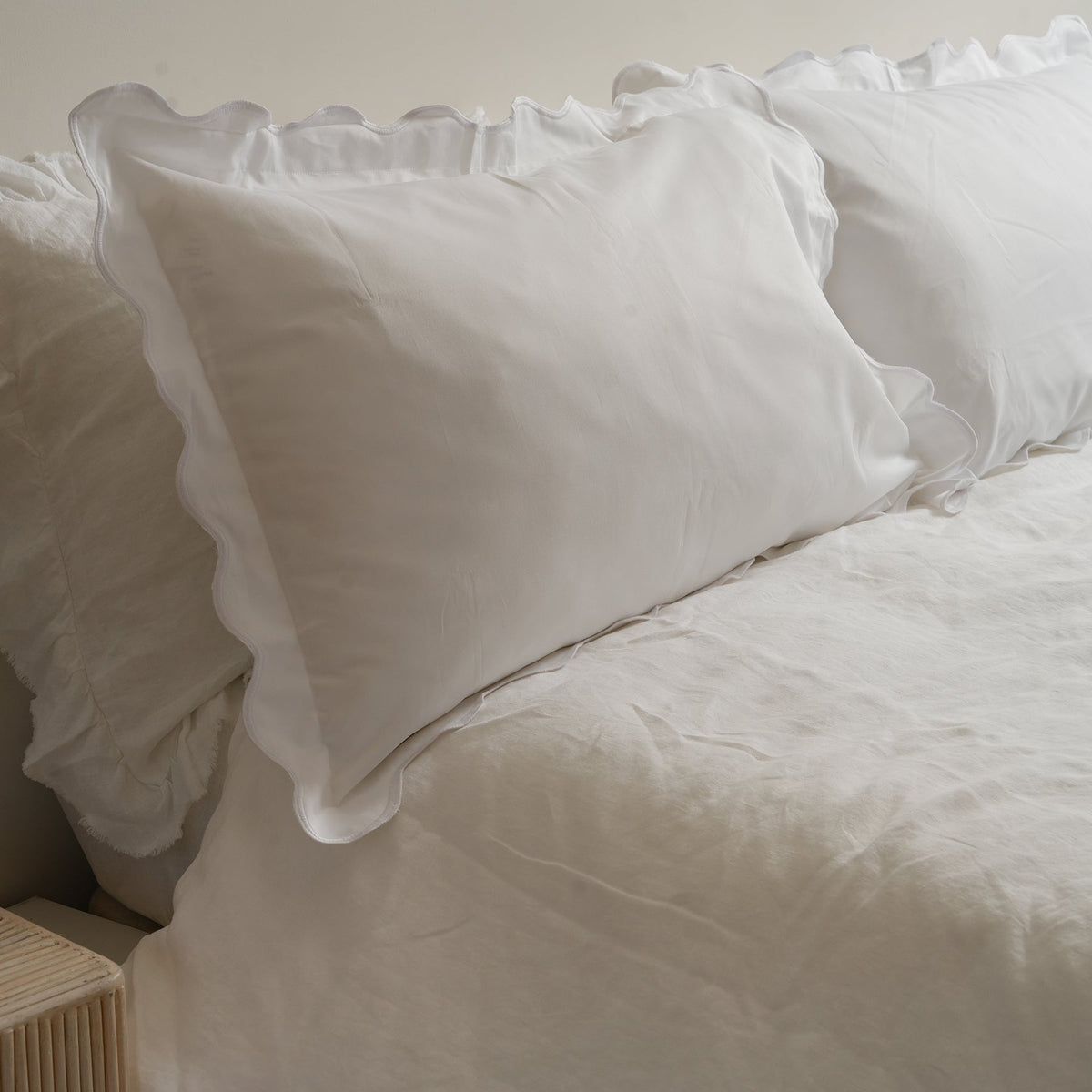 Celine pillowcase pair in white, styled shot