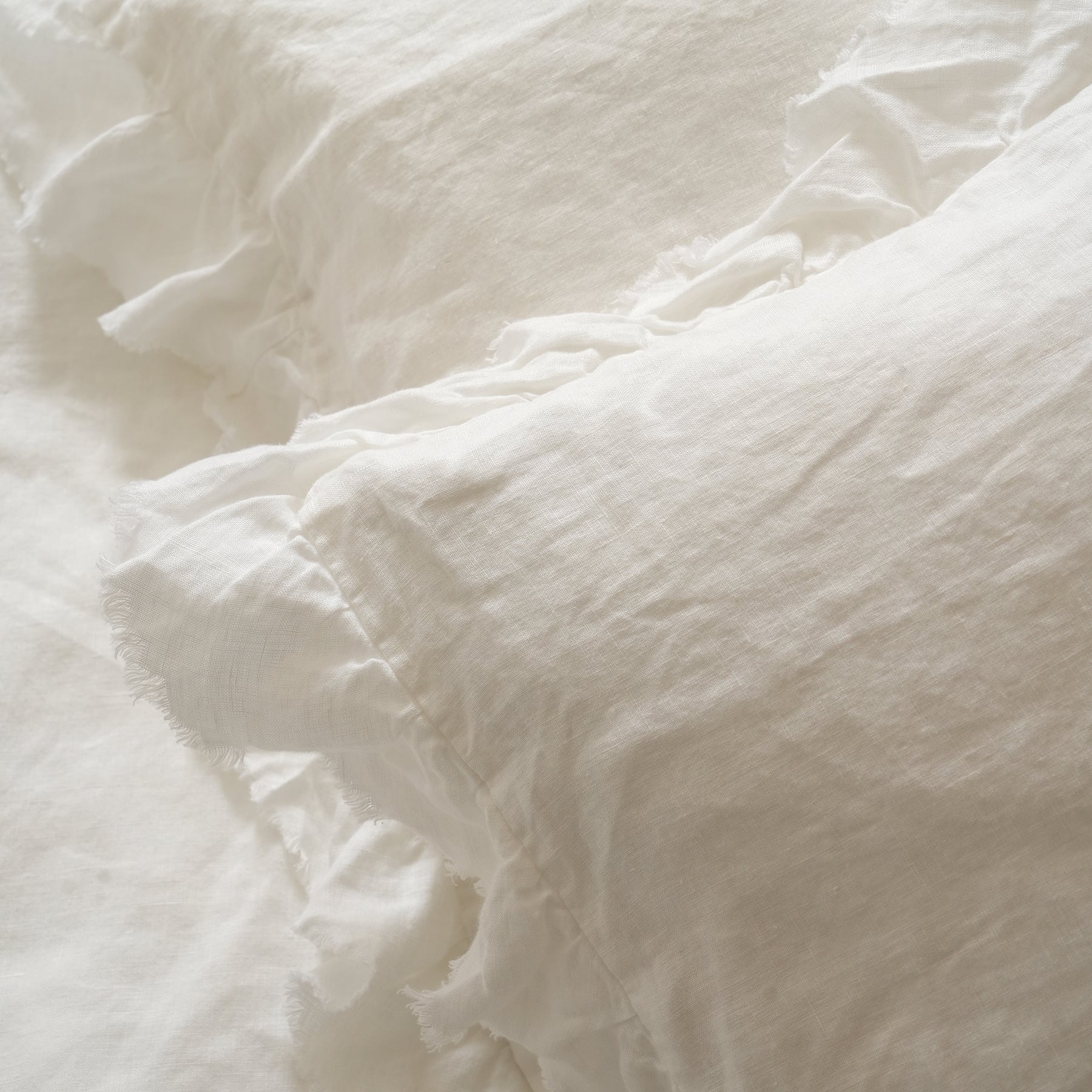 French flax linen ruffle edge pillowcase pair in White detail view