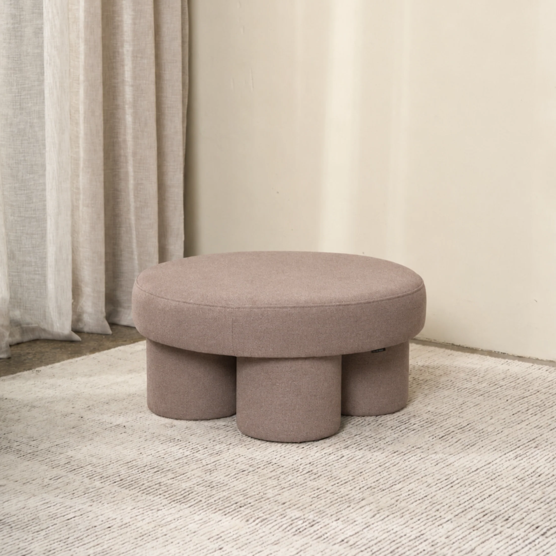 Lume ottoman in Camel, velvet, bold rounded form