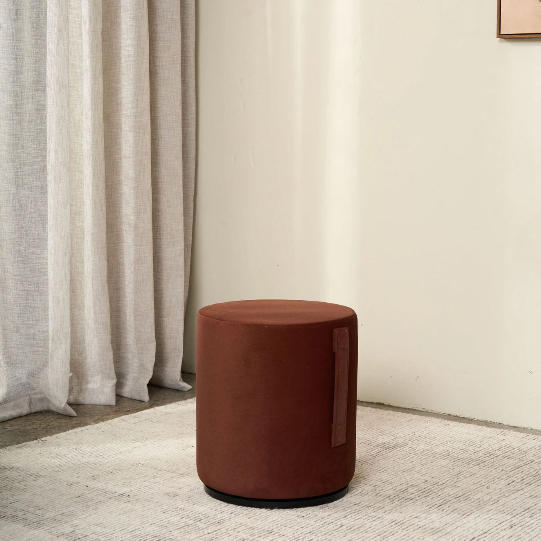 Mee swivel ottoman in Rustwood, compact form, smooth swivel base