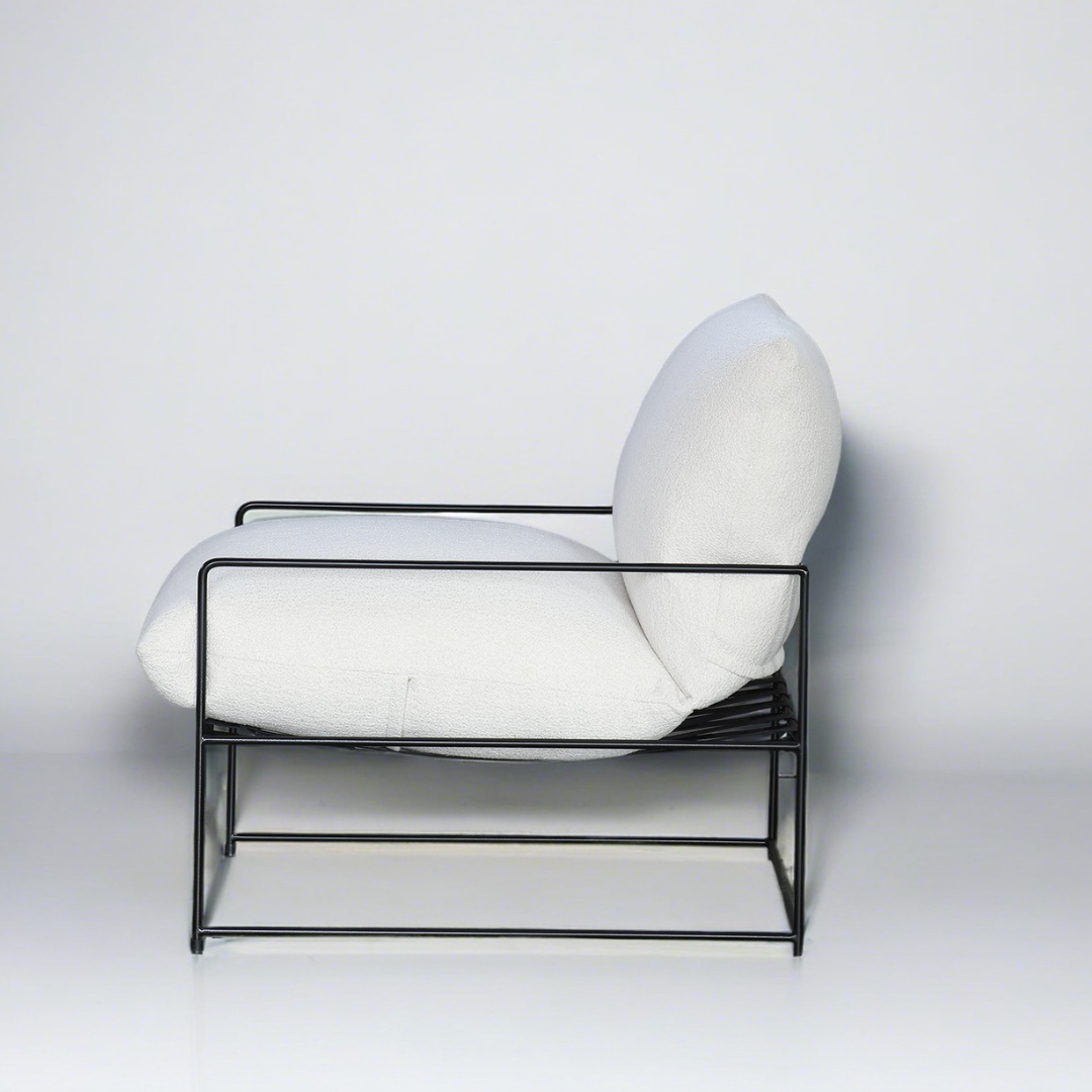 Sammie boucle sling chair in off white, styled shot