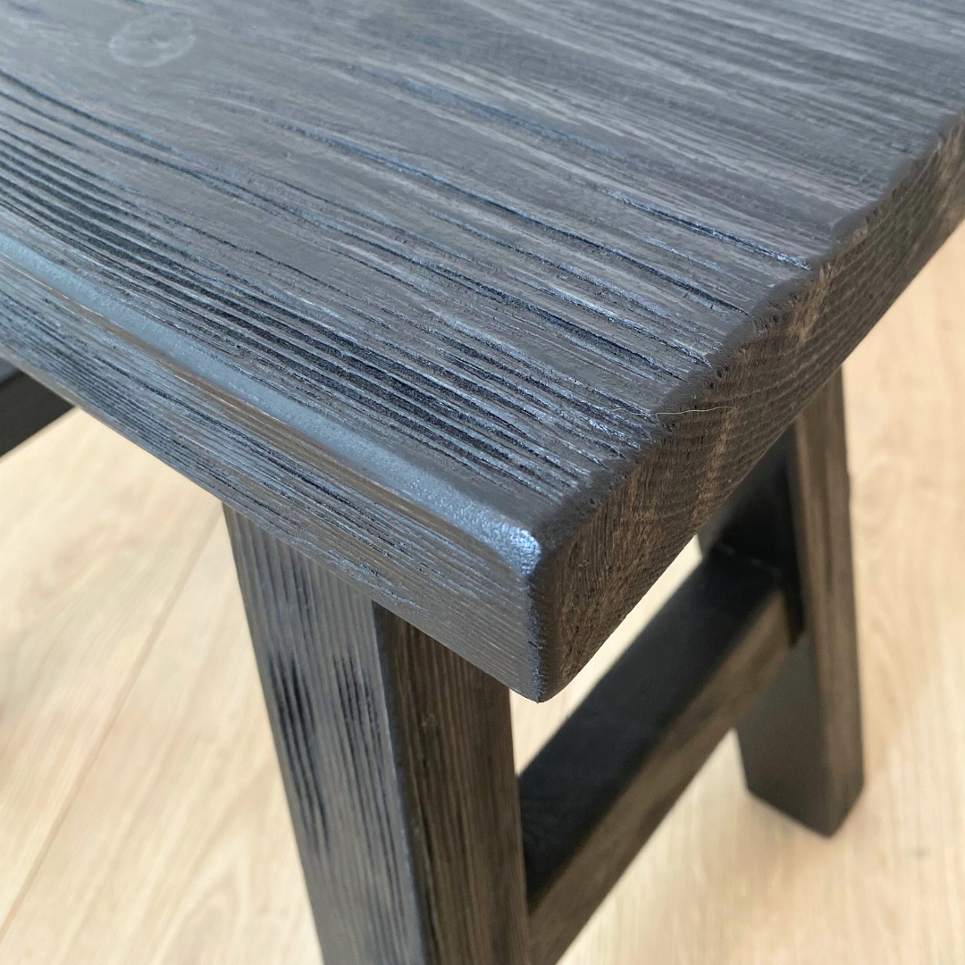 Small reclaimed wood bench in Black side view