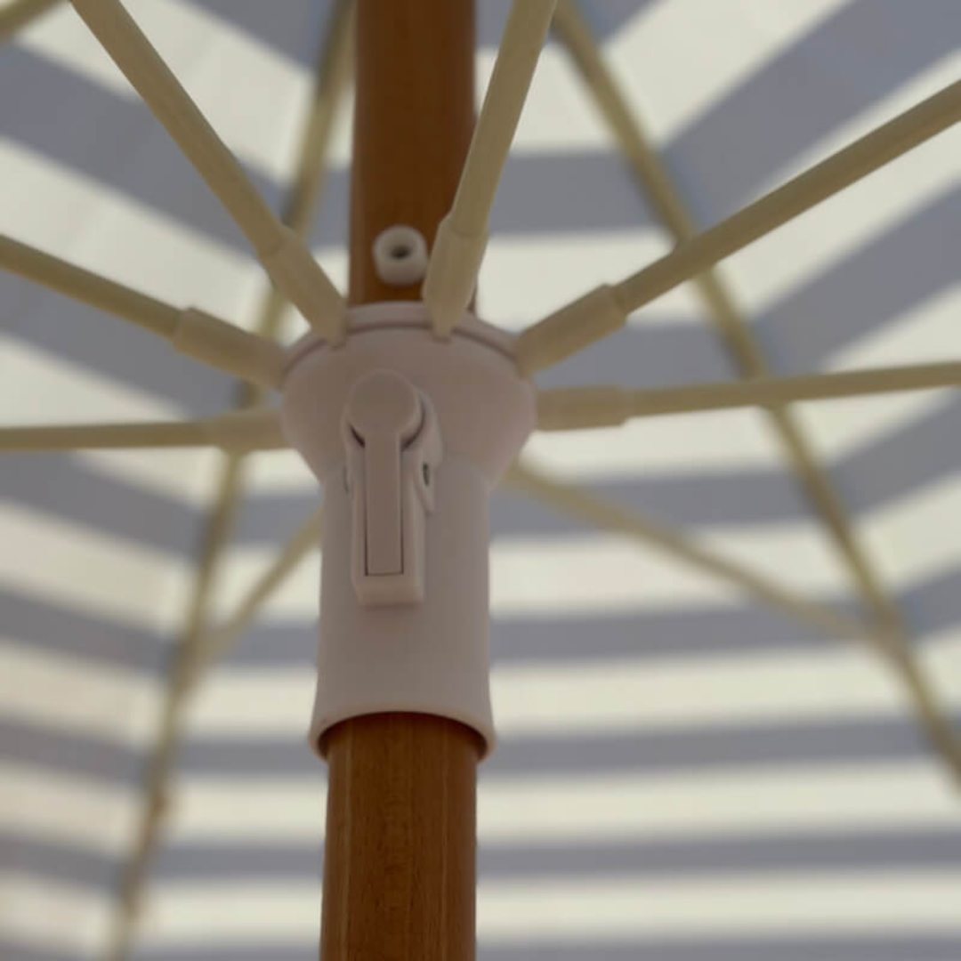 Summer sun umbrella in blue bayou, detail view
